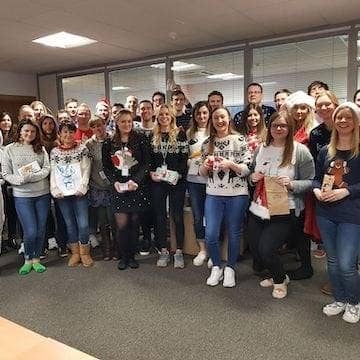 a company photo showing off our Christmas jumpers