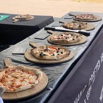 a pizza van providing a free lunch