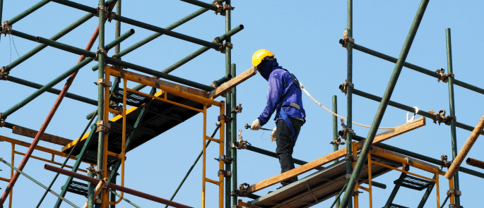 Man working at height on scaffolding