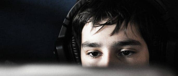 A teenager playing online games