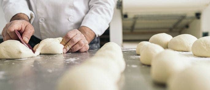 A Baker kneading dough