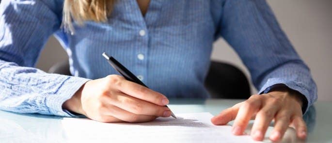 Woman making written notes