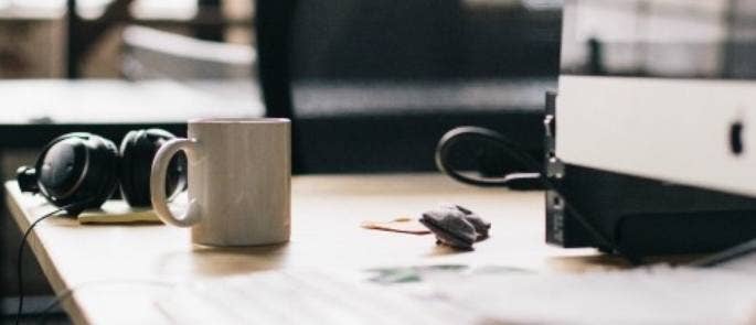 Office desk with coffee mug