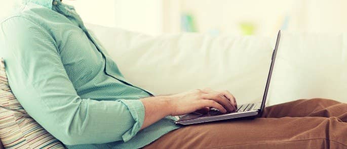 Man on laptop during garden leave