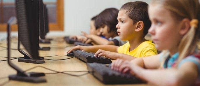 Primary school children on computers