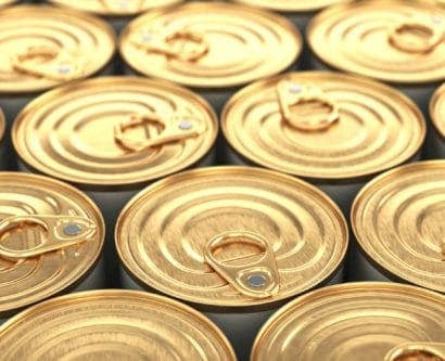 an image of lots of golden tin cans next to each other