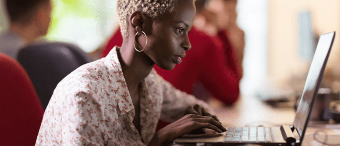 worker on a laptop in an office