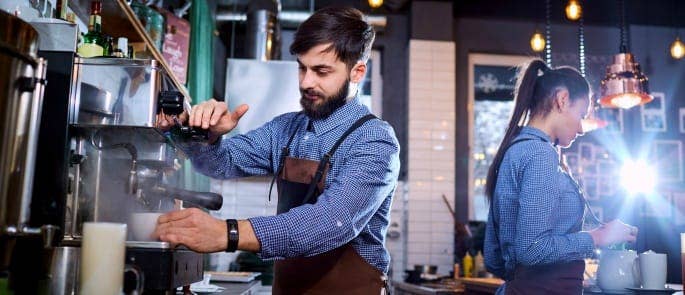 Baristas making coffee and tea