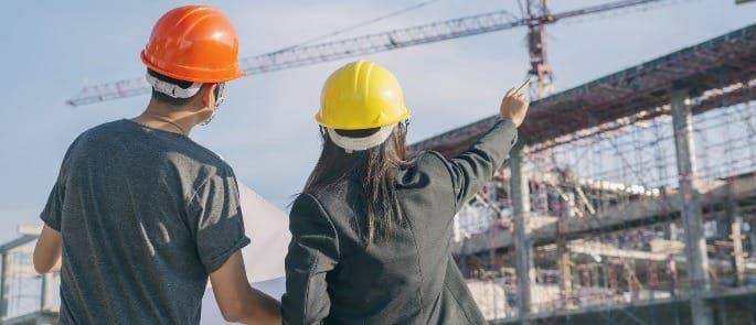 Workers wearing safety helmets