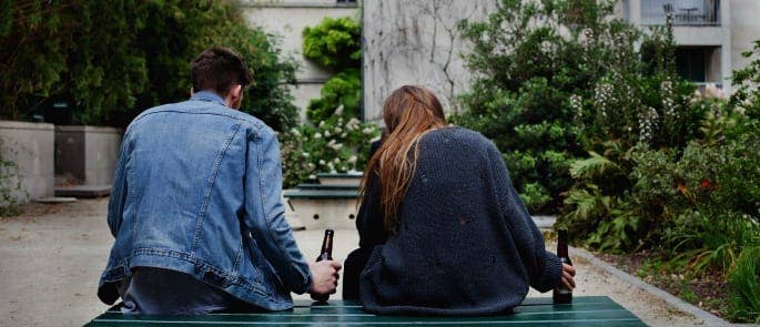 young people drinking in a park