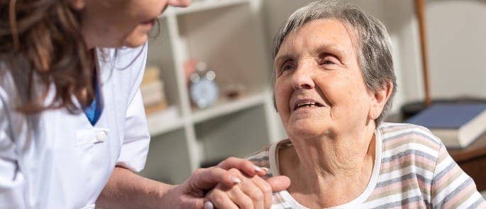 carer talking with a patient