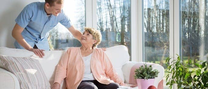 Male caregiver works on effective communication with patient as part of PDP