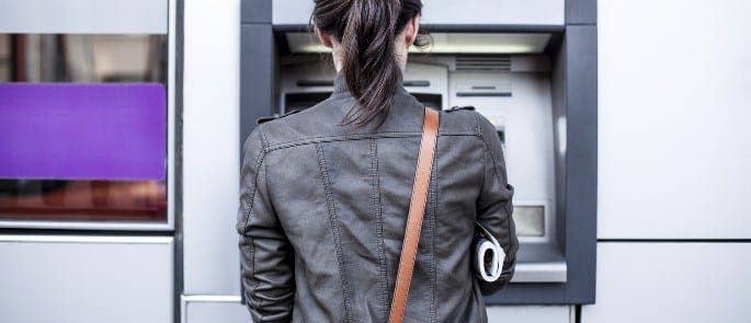 Woman Using a Cash Machine