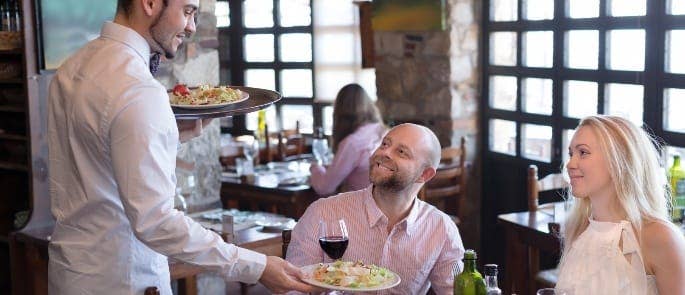 waiter serving food