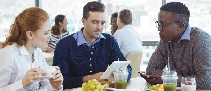 Employees having a healthy lunch as part of their wellbeing programme