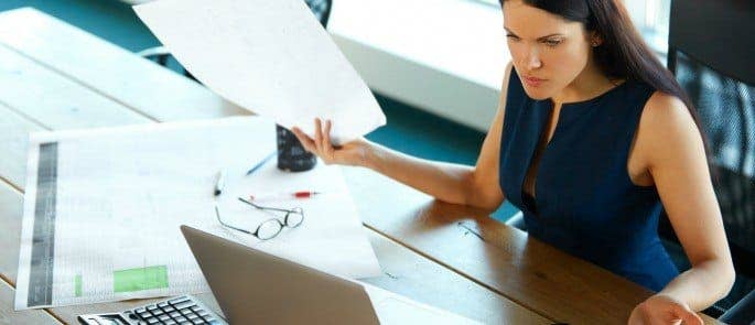 Stressed employee at computer