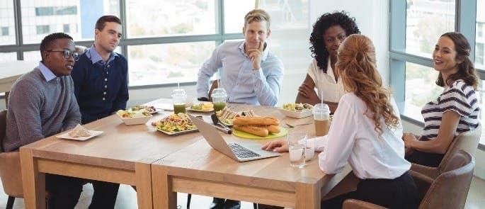 colleagues sharing healthy lunch options