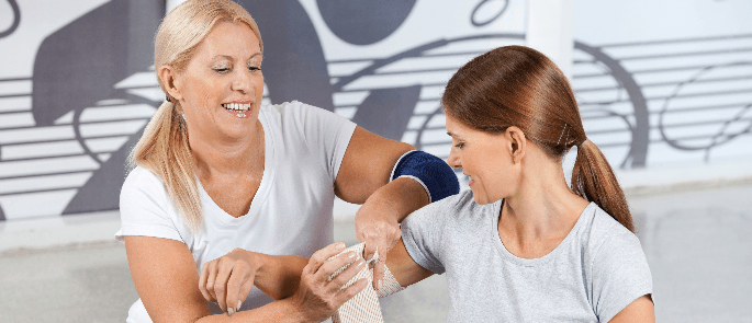 gym staff providing basic first aid