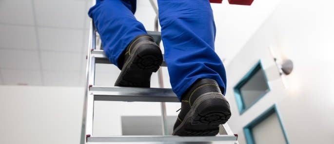 Person climbing a ladder