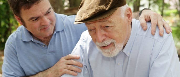 elderly father and son carer