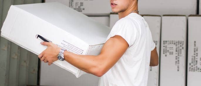 Employee demonstrating manual handling at work