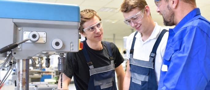 Student attending work experience placement in workshop