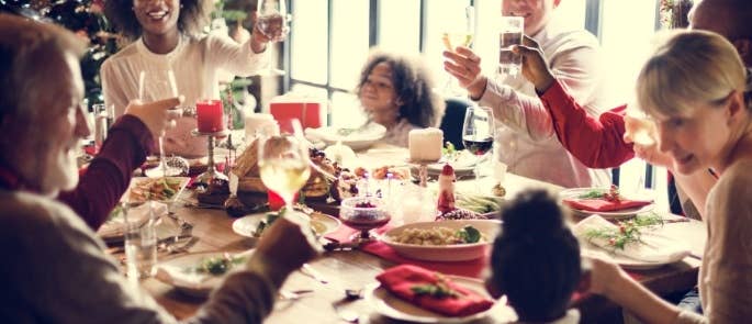 Family around the dinner table at Christmas