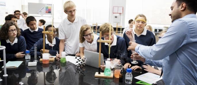 Teachers and students in a science classroom