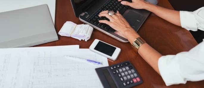 Woman carrying out bookkeeping tasks