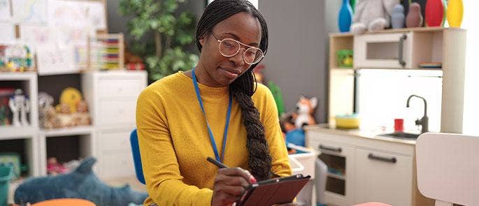 Teacher using a checklist