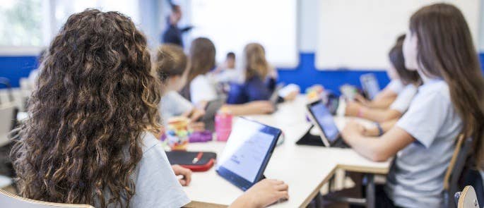 Students on tablets in classroom