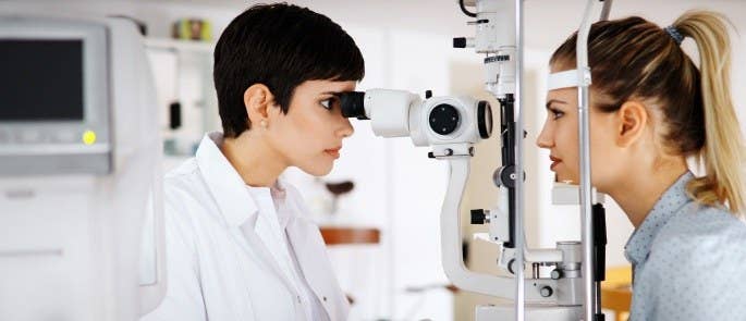 Woman receiving an eye test for an occupational health assessment