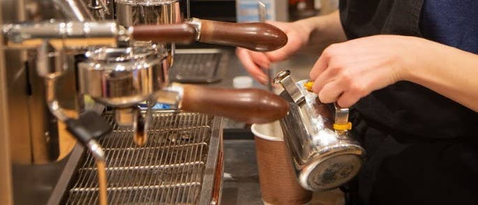 Barista Zoe making coffee