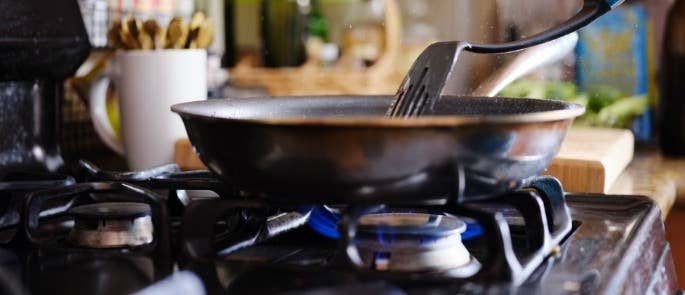A frying pan on a kitchen hob