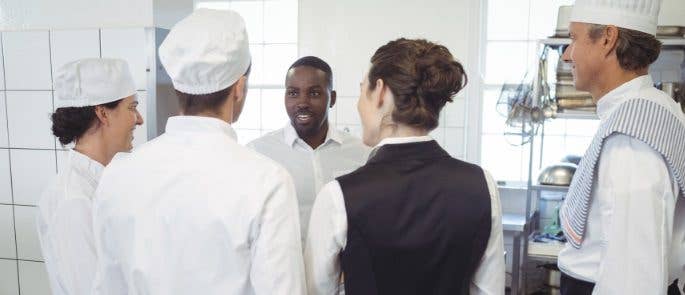 Team meeting in the restaurant kitchen for all staff