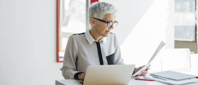 Teacher at a laptop making her professional development plan