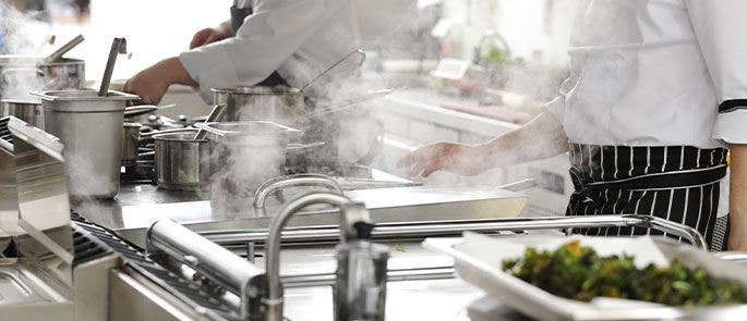 Chefs working in a commercial kitchen