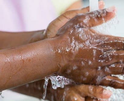 person using 7 techniques of hand washing