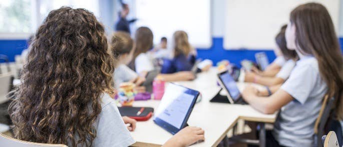 School students using tablet devices