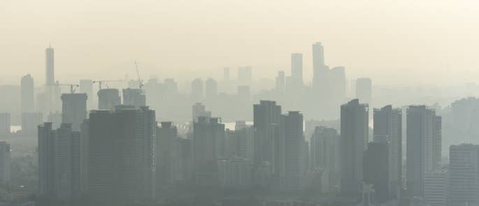 Landscape of urban city with visible air pollution