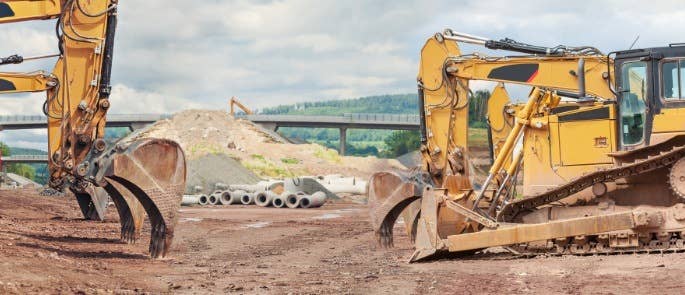 Landscape of diggers pulling back soil ready for a motorway to be built