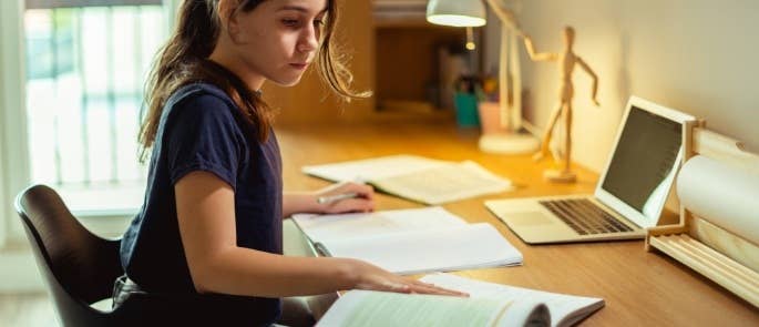 Child doing school work at home