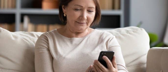 Woman checking phone messages