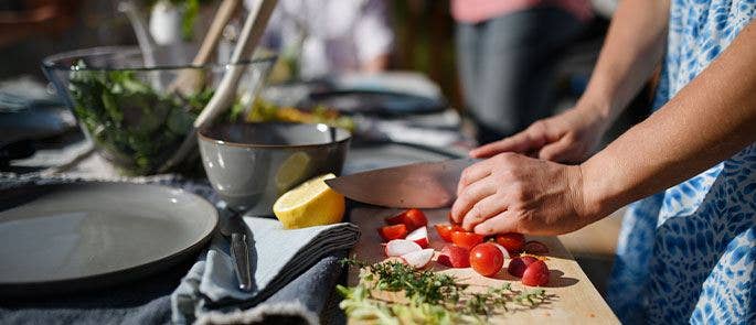 Preparing the salad for a BBQ event