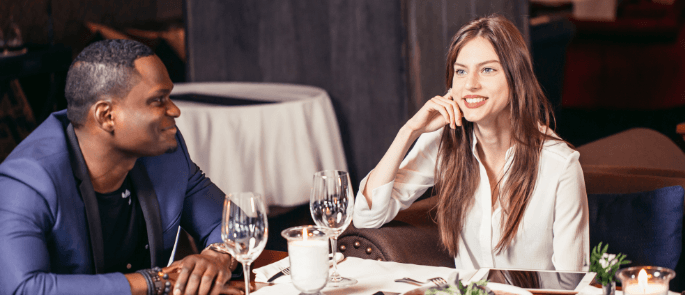 Couple enjoying a meal in a restaurant together