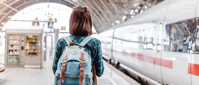 Young person about to get on a train