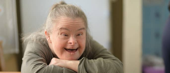 Woman with Down's Syndrome smiling