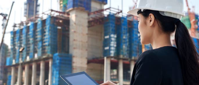 Business woman supervising a construction site