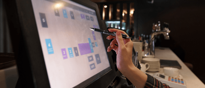 close up of a screen showing a restaurant booking system
