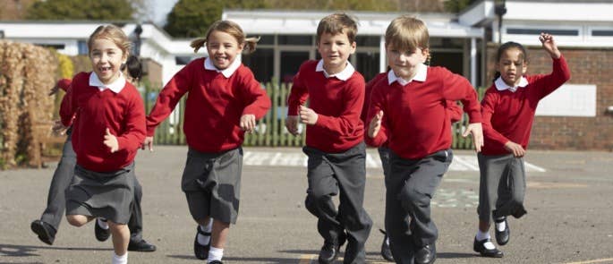 Primary school children playing in the school playground